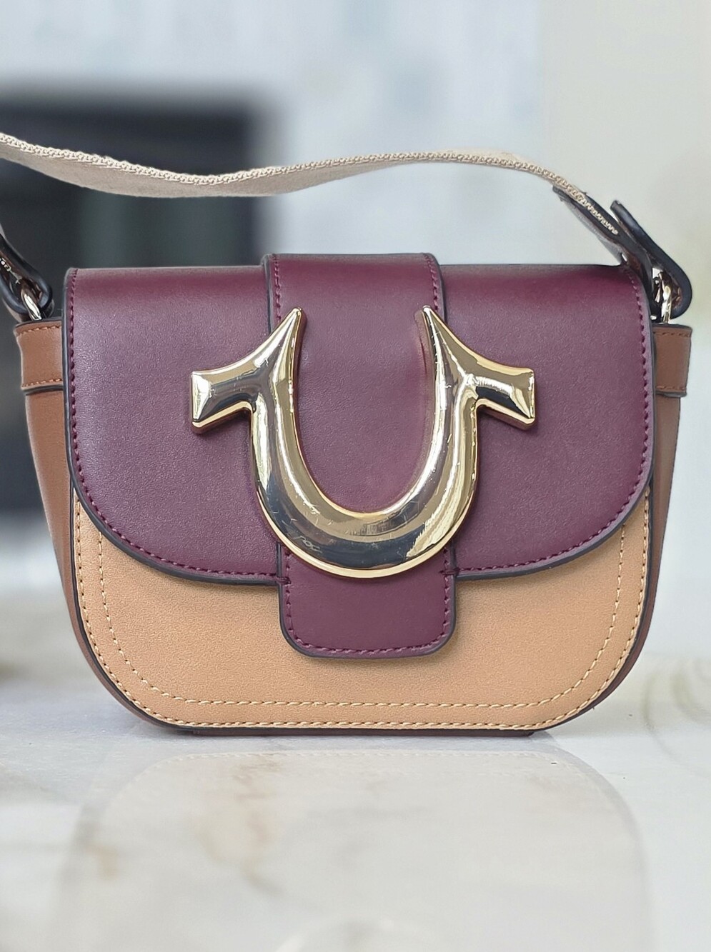 True Religion Colorblock Saddle Bag Burgundy Tan Brown Gold Horseshoe Logo